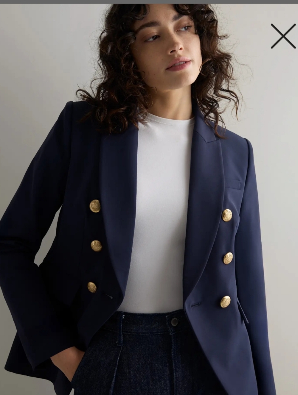 Quince Navy Scuba Captains Convertible Double-Breasted Blazer with Gold Buttons.